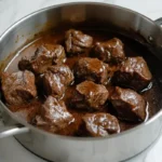 Braised beef heart in a pot.